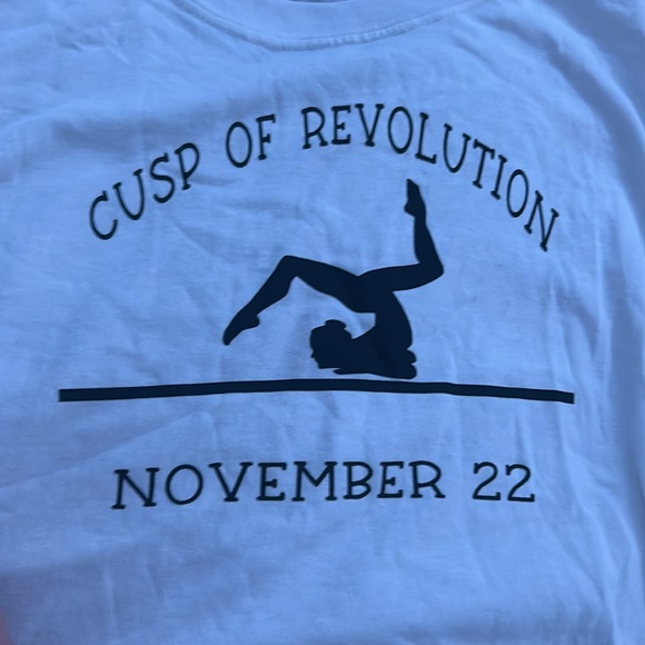 November 22 Cusp of Revolution t-shirt with gymnastics on a beam in all black - Picture 2 of 2